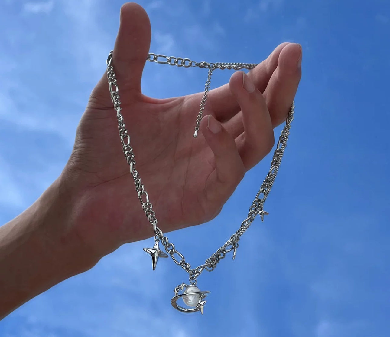 Planet and Pearl necklace