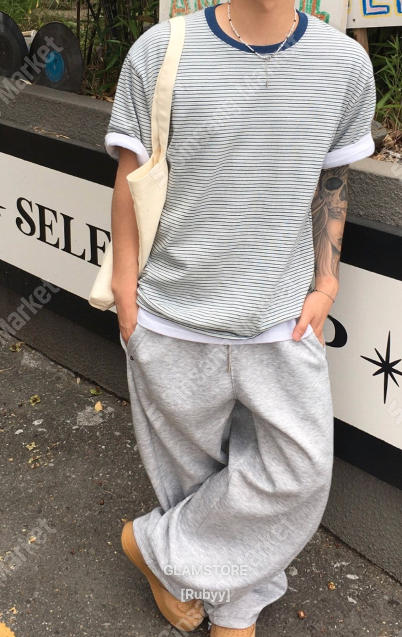 弧形拼接鈕扣闊腳棉褲